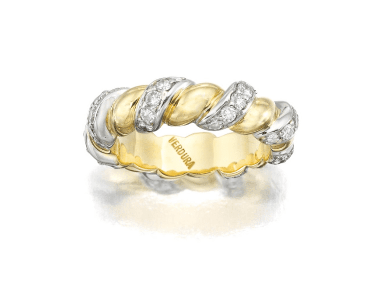 A gold and diamond ring with twisted design.