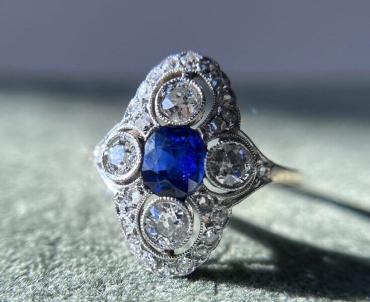 Vintage ring with blue and clear stones.
