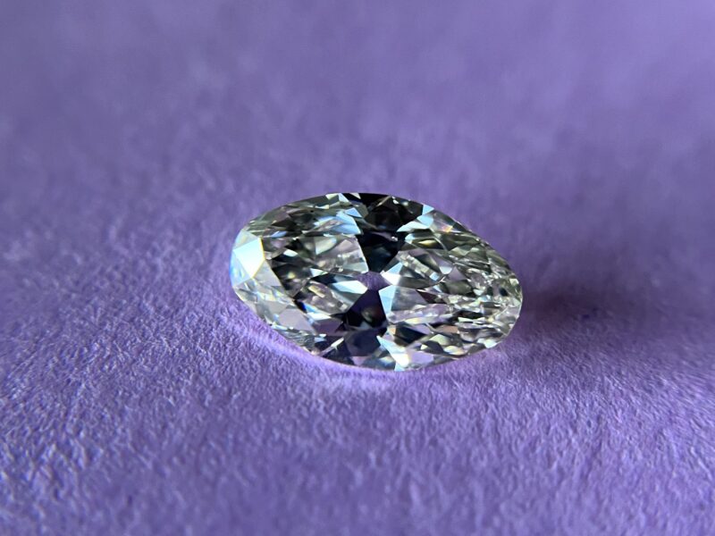 Diamond on a purple textured surface.