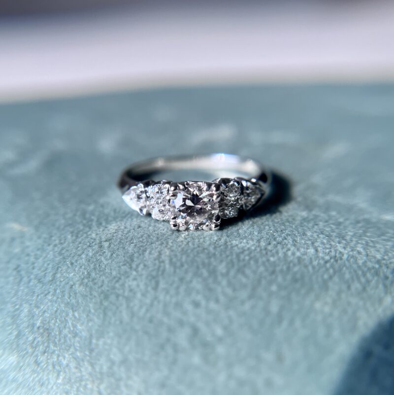 Silver ring with three sparkling diamonds.