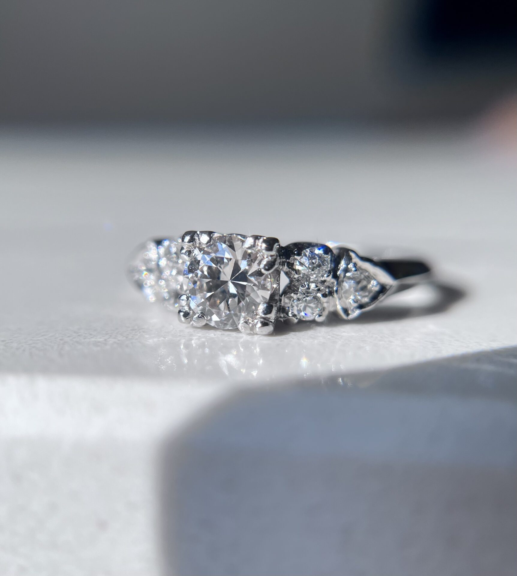 Diamond ring sparkling in natural light.