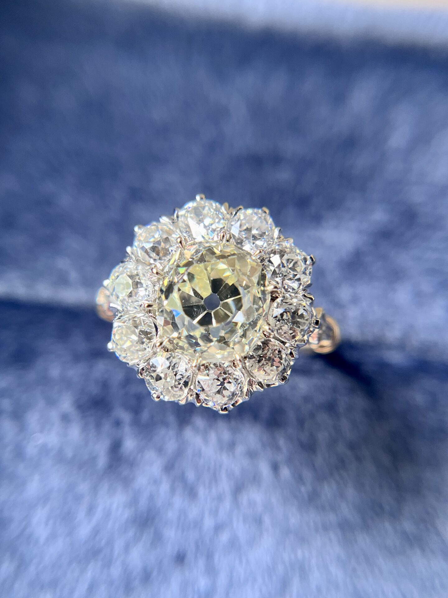A Custom Old Mine Cut Diamond Cluster Ring